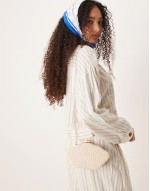 crochet shell clutch bag with crossbody chain strap in off white
