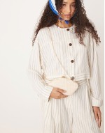 crochet shell clutch bag with crossbody chain strap in off white