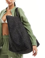 oversized woven shoulder bag in black